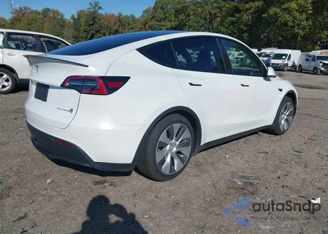 2023 Tesla Model Y Awd/Long Range Dual Motor All-Wheel Drive z USA, uszkodzony, nr VIN 7SAYGDEE9PA052958